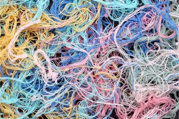 Messy yarn, representing the need for data strategy consulting firms.
